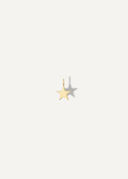 The Sparkle Bar Make A Wish gold star charm with a polished finish for necklaces or bracelets.