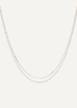 The Sparkle Bar Mariam gold necklace featuring a delicate 1mm diamond-cut cable chain for everyday wear.