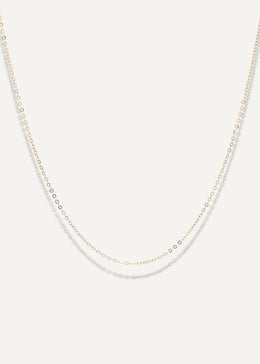 The Sparkle Bar Mariam gold necklace featuring a delicate 1mm diamond-cut cable chain for everyday wear.