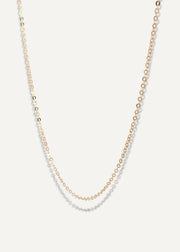 The Sparkle Bar Mariam gold necklace featuring a delicate 1mm diamond-cut cable chain for everyday wear.